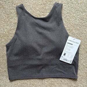 Women Athleta Conscious Crop build in bra size XSmall. New with tag